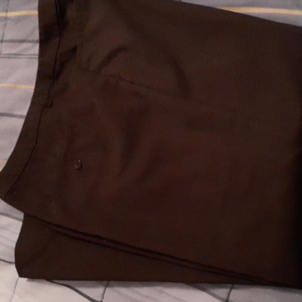 Black pair of cjbanks women's slacks. In a size 16 S.